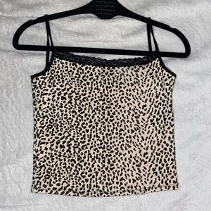 Cheetah print crop top with black lace trim